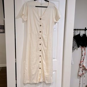Cream colored long button down dress
